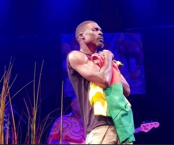 valsero with the Cameroon Flag at a concert