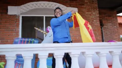 Nigerian Comedian Sabinus Flaunts Cameroon Flag on Kizz Daniel’s “BUGA” Video