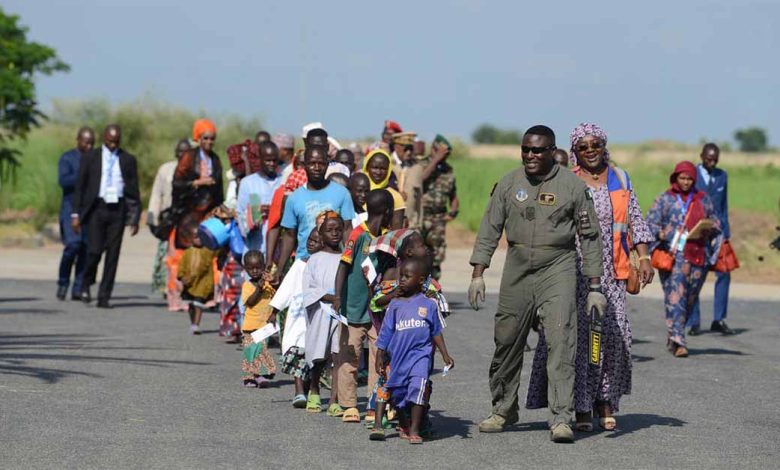 Nigerian Refugees - Image Credit © UNHCR/Xavier Bourgoi